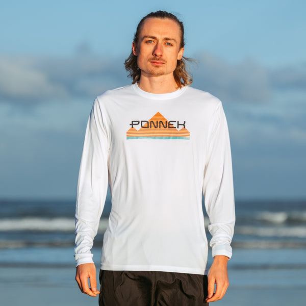 This is Tom, he is 5’11’’ and he wears a medium in the Long Sleeve Trail Tee
